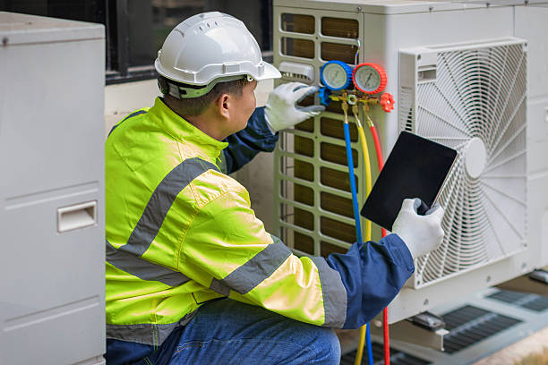 Professional Hvac technician working in Charleston, AR